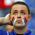 Грустный болельщик сербской сборной // Reuters